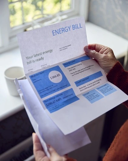 senior-woman-with-usa-energy-bill-trying-to-keep-w-2022-09-29-17-49-30-utc-_1_-_1_